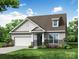 Charming single-Gathering home with stone accents, covered entryway, and attached two car garage at 3009 Bent Willow Dr # 160, Indian Trail, NC 28079