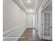 Bright entryway featuring classic wainscoting, tray ceiling, and hard surface floors at 3009 Bent Willow Dr # 160, Indian Trail, NC 28079