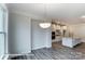 Bright kitchen with white cabinets and an island with stone countertops at 3009 Bent Willow Dr # 160, Indian Trail, NC 28079