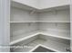 Spacious pantry features ample shelving for organized storage at 3009 Bent Willow Dr # 160, Indian Trail, NC 28079