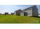 Large, green backyard, with ample space for outdoor activities at 327 Brinkley Dr # 107, Kings Mountain, NC 28086