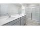 Bathroom features a double sink vanity, modern finishes, and a glass-enclosed shower at 327 Brinkley Dr # 107, Kings Mountain, NC 28086