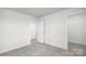 Bedroom features carpeted floors and entrance to walk-in closet at 327 Brinkley Dr # 107, Kings Mountain, NC 28086