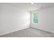 Bright bedroom featuring a large window and neutral carpeting at 327 Brinkley Dr # 107, Kings Mountain, NC 28086