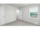 Cozy bedroom offers neutral carpeting and ample natural light at 327 Brinkley Dr # 107, Kings Mountain, NC 28086