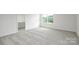 Spacious bedroom with neutral carpet, a large window, and ample natural light, creating a serene retreat at 327 Brinkley Dr # 107, Kings Mountain, NC 28086