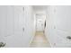 Hallway with luxury vinyl flooring and neutral paint scheme at 327 Brinkley Dr # 107, Kings Mountain, NC 28086