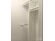 This is a very tidy, white closet with built in shelves and ample hanging space at 3240 Heathstead Pl, Charlotte, NC 28210