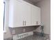 Kitchen showing cabinets and counter details with view to the outside at 3240 Heathstead Pl, Charlotte, NC 28210
