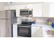Stainless steel refrigerator and stove in the kitchen of this home at 3240 Heathstead Pl, Charlotte, NC 28210
