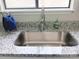Close up of kitchen sink showing granite countertops and stainless steel faucet at 3240 Heathstead Pl, Charlotte, NC 28210