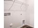 A bright, empty laundry room with wire shelves and hard surface floors at 339 Brinkley Dr, Kings Mountain, NC 28086