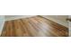 New, pristine laminate wood flooring, base trim, and fresh paint at 418 N Pear St, Gastonia, NC 28054