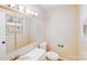 This bathroom features a vanity sink and toilet at 712 Stevens St, Gastonia, NC 28054