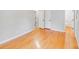 Spacious bedroom with hardwood flooring offers lots of space for furnishings and decor at 712 Stevens St, Gastonia, NC 28054