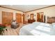 Cozy bedroom featuring hardwood floors, wooden trim, and two comfortable twin beds at 809 Liberty Rd, Gold Hill, NC 28071