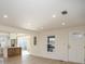 Bright living room showcasing the new flooring and open layout to the kitchen at 922 Grace Ave, Kannapolis, NC 28083