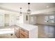 Open-concept living area featuring light wood floors and a bright, airy feel with plenty of natural light at 922 Grace Ave, Kannapolis, NC 28083