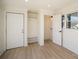Functional mudroom with storage, cubbies, and a bench, leading to the laundry area and exterior access at 922 Grace Ave, Kannapolis, NC 28083
