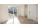 Convenient mudroom features a sliding glass door, storage with cubbies and a bench, and access to the main living area at 922 Grace Ave, Kannapolis, NC 28083