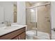 Bathroom featuring a glass-enclosed shower and modern vanity at 9481 Coast Laurel Ave # 12, Concord, NC 28027