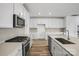 Well-equipped kitchen with stainless steel appliances, ample counter space, and plenty of storage at 9481 Coast Laurel Ave # 12, Concord, NC 28027