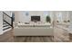 Modern living room with contemporary furniture, hardwood floors, and plenty of natural light at 9481 Coast Laurel Ave # 12, Concord, NC 28027
