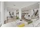 Open-concept living space with a view of the dining area, kitchen, and living room at 9481 Coast Laurel Ave # 12, Concord, NC 28027