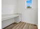 Bright, modern office space with built-in desk, storage, and natural light at 9481 Coast Laurel Ave # 12, Concord, NC 28027