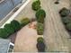 Overhead shot of backyard patio with seating surrounded by manicured landscaping and fresh lawn at 1001 Mesa Verde Dr, Fort Mill, SC 29707