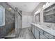 Modern bathroom featuring a tiled shower, double vanity, and neutral color palette at 1001 Mesa Verde Dr, Fort Mill, SC 29707