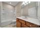 Bathroom features a vanity with sink, framed mirror, and combined tub with shower at 1001 Mesa Verde Dr, Fort Mill, SC 29707