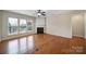 Living room featuring hardwood floors, a ceiling fan and fireplace at 1001 Mesa Verde Dr, Fort Mill, SC 29707