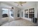 Relaxing sunroom with sliding doors, tiled floors, and access to the backyard at 1001 Mesa Verde Dr, Fort Mill, SC 29707