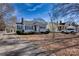 Charming single-story home with blue shutters, manicured bushes, brick chimney, and inviting front entrance at 111 Courtland St, Chester, SC 29706