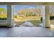 Inviting front porch overlooking the lawn, offering an unobstructed view of the neighborhood at 137 Lancaster St, Chester, SC 29706