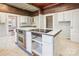 Kitchen with a large island, stove top, and oven at 137 Lancaster St, Chester, SC 29706