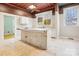 Spacious kitchen with a center island, white cabinets, and unique ceiling at 137 Lancaster St, Chester, SC 29706