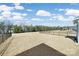 A well-kept lawn that is surrounded by a black fence at 14032 Canemeadow Dr, Charlotte, NC 28278
