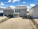 Aerial shot of the backyard, situated between neighboring houses and a black fence at 14032 Canemeadow Dr, Charlotte, NC 28278