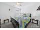 Bedroom with a large window, a comfy queen-sized bed, and plenty of natural light at 14032 Canemeadow Dr, Charlotte, NC 28278