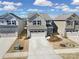 Charming two-story home with a two-car garage and well-manicured front yard at 14032 Canemeadow Dr, Charlotte, NC 28278