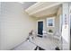 Inviting front porch with seating area, perfect for enjoying the outdoors at 14032 Canemeadow Dr, Charlotte, NC 28278
