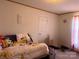 Cozy bedroom with decorative pillows and ample natural light, offering a comfortable living space at 2084 W Memorial Hwy Rd, Union Grove, NC 28689