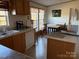 Bright kitchen area features ample counter space, white appliances, and natural light at 2084 W Memorial Hwy Rd, Union Grove, NC 28689
