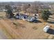 Expansive aerial view showcasing home with solar panels, boat, camper, and spacious, well-maintained lawn at 2297 Blossom Dr, Rock Hill, SC 29730