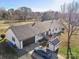 This aerial view shows the home's driveway, garage, outdoor shed, and deck at 2297 Blossom Dr, Rock Hill, SC 29730