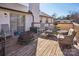 Spacious deck with a fire pit, chairs, and a view of the backyard at 2297 Blossom Dr, Rock Hill, SC 29730