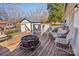 Spacious deck with a fire pit, chairs, and a view of the backyard at 2297 Blossom Dr, Rock Hill, SC 29730