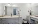 Bathroom featuring a sink, ample counter space, and a basket for storage, set against wood flooring at 2297 Blossom Dr, Rock Hill, SC 29730